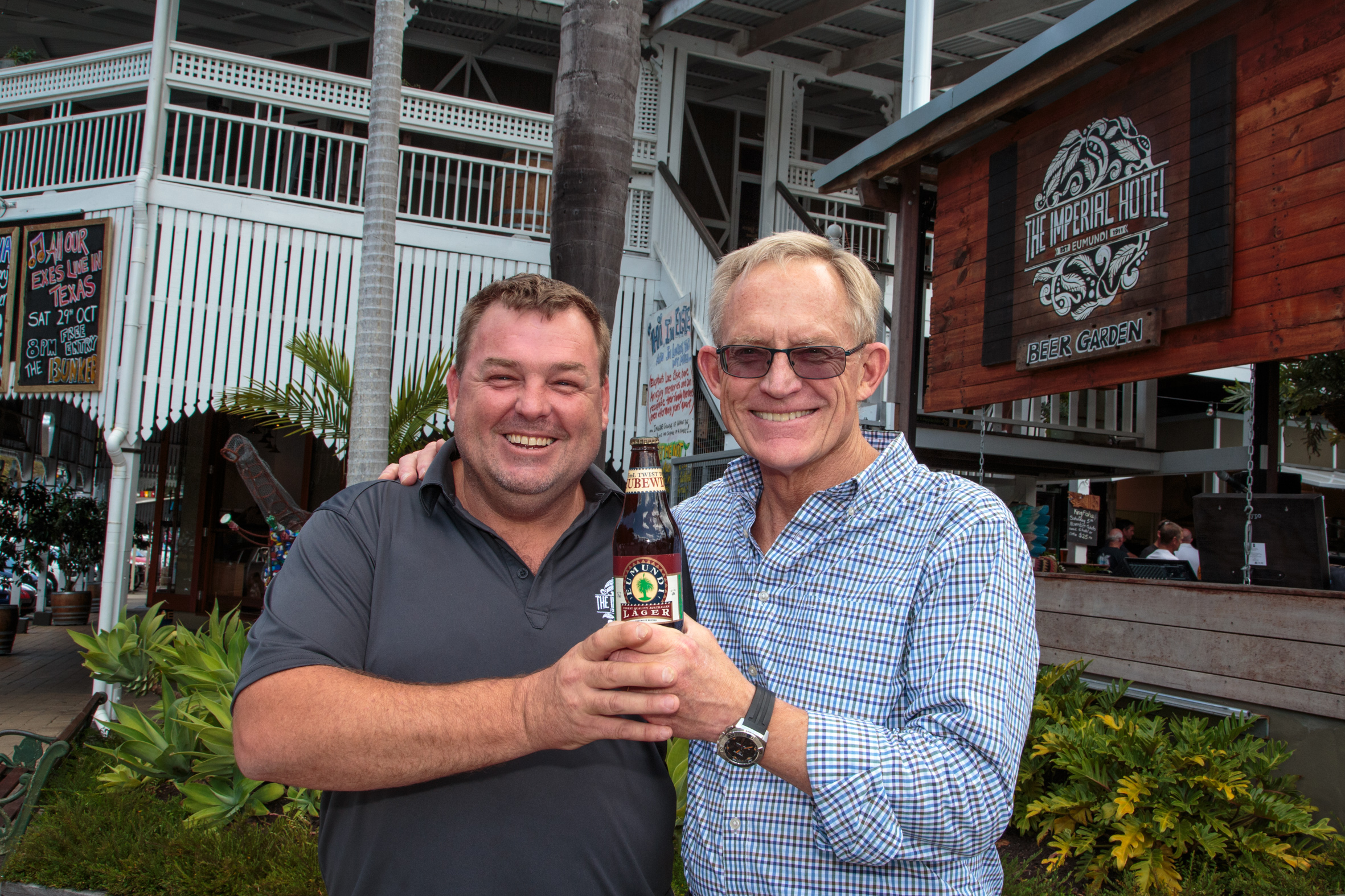 imperial-hotel-manager-brendan-fenlon-and-chuck-hahn-with-a-bottle-of-th