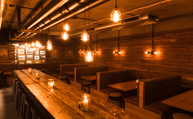 Inside 4 Pines Underground which is packed with recycled timber and bunker lighting